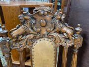 A pair of French carved oak armchairs with brown leather upholstery and rampant lion crests, 19th century, 65cm across the arms - 4