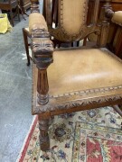 A pair of French carved oak armchairs with brown leather upholstery and rampant lion crests, 19th century, 65cm across the arms - 6