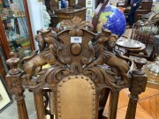 A pair of French carved oak armchairs with brown leather upholstery and rampant lion crests, 19th century, 65cm across the arms - 7