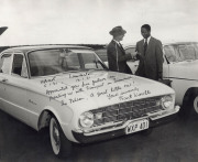 WEST INDIES - 1960-61 TOUR OF AUSTRALIA: photograph of West Indian Captain Sir Frank Worrell receiving keys for a hire car, dated "Hobart 5.1.61" and Launceston "10.1.61" with signed dedication "Appreciated your fine gesture in providing us with transpo