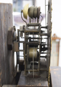 An impressive English grandfather clock, triple train three weight movement with chime and strike, housed in ornately carved oak case, ​19th century, 244cm high - 2