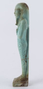 An Egyptian green faience shabti figure, circa 1st - 2nd Century AD, 15cm high - 7