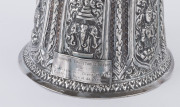 A Laotian silver footed bowl with repousse decorated and alternating panels of the three-headed elephant (airavata) and deities, separated by elaborate floral scrolling and borders with foliate lotus leaf pattern, early 20th century. A silver plaque attac - 5