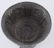 A Laotian silver footed bowl with repousse decorated and alternating panels of the three-headed elephant (airavata) and deities, separated by elaborate floral scrolling and borders with foliate lotus leaf pattern, early 20th century. A silver plaque attac - 7