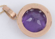 A 14ct rose gold and amethyst circular pendant on later gold chain, 53cm long - 2