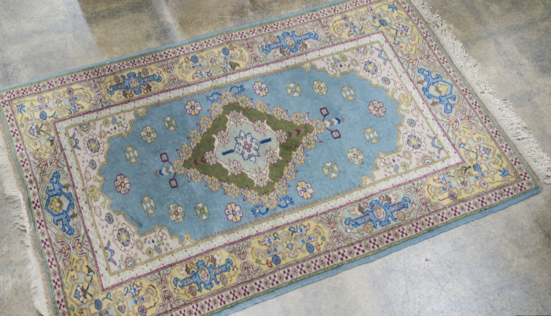 A Turkish hand-woven wool rug, ​180 x 105cm