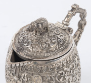 An Indian silver sugar bowl and jug adorned with animals in foliate motif and elephant finials with raised trunks, 19th century, (2 items), 12cm and 15cm high, 890 grams total - 8