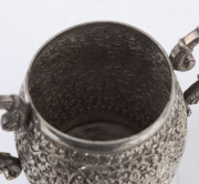 An Indian silver sugar bowl and jug adorned with animals in foliate motif and elephant finials with raised trunks, 19th century, (2 items), 12cm and 15cm high, 890 grams total - 16