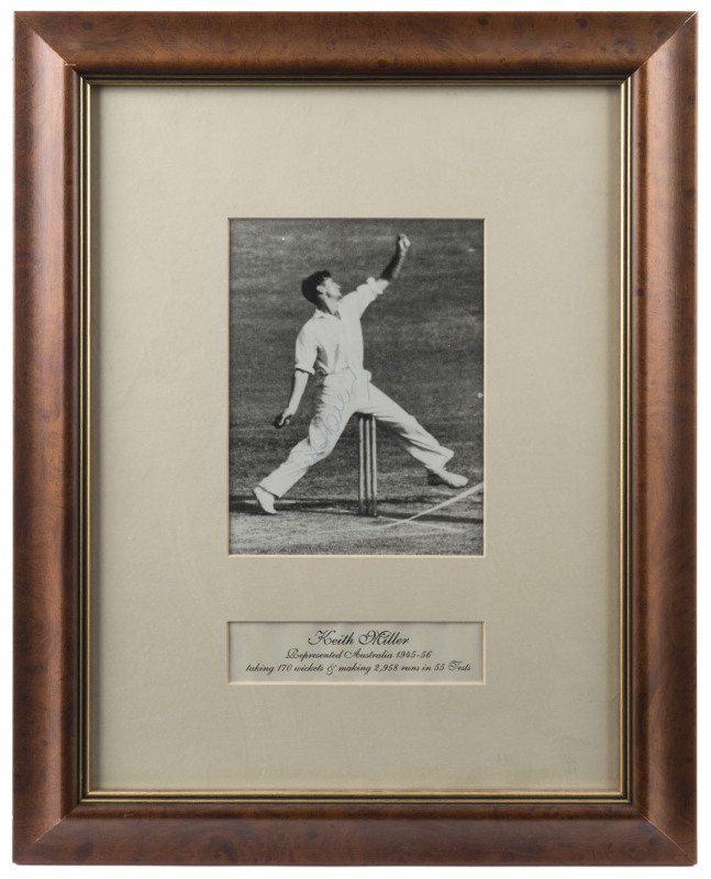 KEITH MILLER: signature on image of Miller bowling, caption beneath showing Miller's Test Match statistics; framed and glazed, overall 36 x 46.5cm.