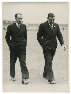 DON BRADMAN - ENGLAND vs AUSTRALIA, 4th TEST, OLD TRAFFORD, JULY 22-26, 1938: original press photograph (Fox Photos, London), showing a besuited Bradman & Wally Hammond walking back to the pavilion after having inspected the wicket; 14.5 x 19.5cm. Australia won a low-scoring game by 5 wickets, Bradman scoring a pivotal 103 in the first innings, the only century recorded in the game.