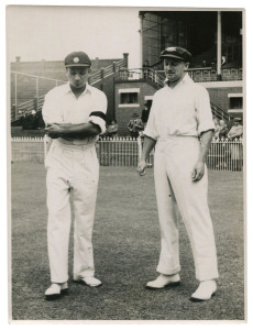 DON BRADMAN - AUSTRALIA vs INDIA, 3rd TEST, MCG, JAN. 1-5, 1948: original press photograph (Melbourne Age), showing Bradman tossing the coin as Indian Captain Lala Armanath looks on; 15.5 x 21cm. The Australians won the Third Test by 233 runs, Bradman scoring 132 runs in the first innings and remaining unbeaten on 127 in the Second Innings, declaring when batting partner Arthur Morris reached his century.