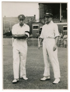 DON BRADMAN - AUSTRALIA vs INDIA, 3rd TEST, MCG, JAN. 1-5, 1948: original press photograph (Melbourne Age), showing Bradman tossing the coin as Indian Captain Lala Armanath looks on; 15.5 x 21cm. The Australians won the Third Test by 233 runs, Bradman sc