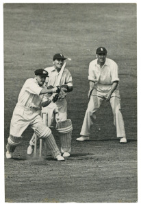 DON BRADMAN - England vs AUSTRALIA, 1948 "Invincibles" Ashes Tour: original press photograph (The Sport and General Press Agency, London), showing Australian captain Don Bradman cutting the ball while English wicket keeper Godfrey Evans and slip fielder Jack Crapp look on; 10 x 15cm. Australia, captained by Bradman, remained unbeaten throughout the tour winning the Test Series 4-0, the Third Test being drawn.