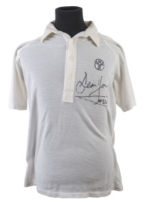 DEAN JONES: A match-worn short-sleeved white Australian team shirt with ACB logo; signed below the logo "Dean Jones #324".