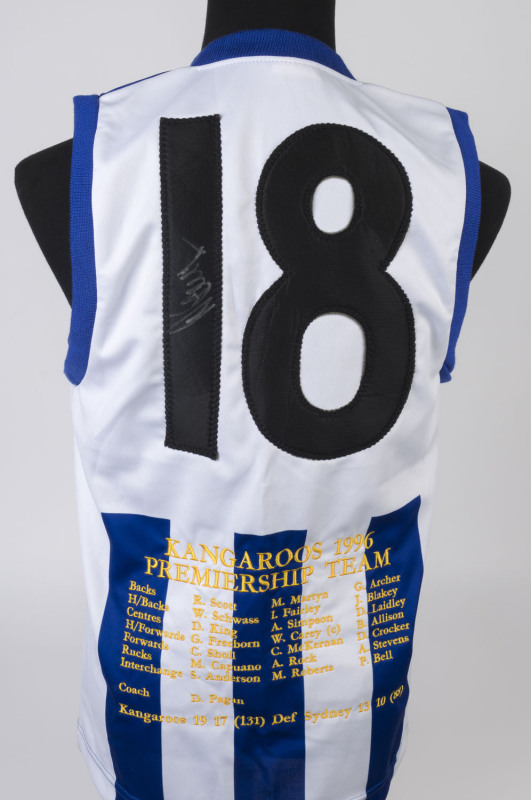 WAYNE CAREY: signature on 1996 Premiership Team commemorative guernsey for player '18' (Carey), with names of team members and match details embroidered on reverse.