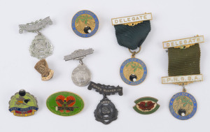 BOWLS - PAPUA NEW GUINEA: selection of late 1960s-mid 1980s badges incl. Port Moresby/Boroko Life Member badge in 9k gold engraved "Egner Olsen/1968" on reverse; also 1975 Port Moresby Bowling Club Silver Anniversary, 1978 PNG Bowls Assoc/Commonwealth Games Edmonton Canada & PNG/World Bowls1980 badges all enamelled, plus delegate badges and two other items in sterling silver. (9 items)