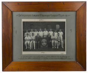 Large format original photograph by Harry Krantz, titled "VIC. INTERSTATE RAILWAY WORKSHOPS CRICKET TEAM - 1922" with the twelve team members and two officials named in manuscript below the image; in original period frame, overall 63.5 x 76cm.