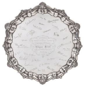 A PRESENTATION SALVER TO EDGAR BRITT, 1959 A massive sterling silver presentation footed salver (made by Atkin Brothers, Sheffield 1955) with the engraved dedication "PRESENTED BY OWNERS OF HORSES TRAINED NY CAPTAIN C.F. ELSEY to EDGAR BRITT upon his reti