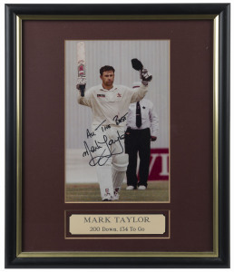 MARK TAYLOR: "200 Down, 134 to Go", signed photo photograph display of Taylor reaching 200, on his way to 334 not out in the Second Test against Pakistan in 1996, equalling the record Test Innings score set by Don Bradman, framed and glazed, overall 32x39cm.