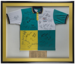 1998 KUALA LUMPUR - AUSTRALIAN SWIMMING TEAM: large display featuring team shirt signed by 41 Australian squad members including Giaan Rooney, Petra Thomas, Geoff Huegill, Michael Klim, Keiran Perkins, Ian Thorpe, Grant Hackett & Susie O'Neill; framed and