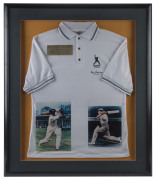 DON BRADMAN: display featuring signed Bradman Museum cricket shirt, plus two signed colour images of "The Don" strokemaking, attractively window mounted, framed & glazed, overall 87 x103cm. - 2