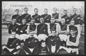 ESSENDON: 1909 postcard showing "ESSENDON F.C.", photographer J.E. Barnes (Kew), publisher Lincoln, Stuart & Co (Outfitters), unused. Good condition.