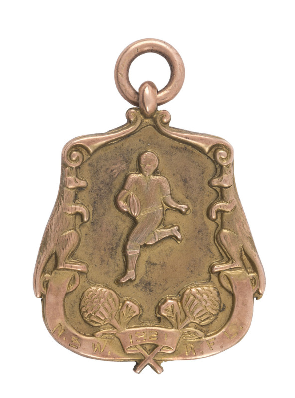NORTH SYDNEY: Attractive 9ct gold premiership fob engraved on front "N.S.W. 1921 R.F.L." and verso, "TRAMWAY R.F.L. Won By NORTH SYDNEY. F.GUISE". ​North Sydney won the first grade premiership in 1921 and 1922.
