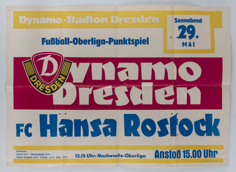 GERMAN PREMIER LEAGUE: 1982 (May 29) match poster for Dynamo Dresden v Hansa Rostock; filing punctures along central folds, few annotations verso, very good condition overall; 85x61cm.