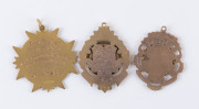 RIFLE CLUBS: Three attractive 9ct gold presentation fobs (16.7gms total), one unpresented, one engraved for the WOOROLOO RIFLE CLUB in 1926 and one engraved for the ROCHESTER RIFLE CLUB 1929-30. (3 items). - 2