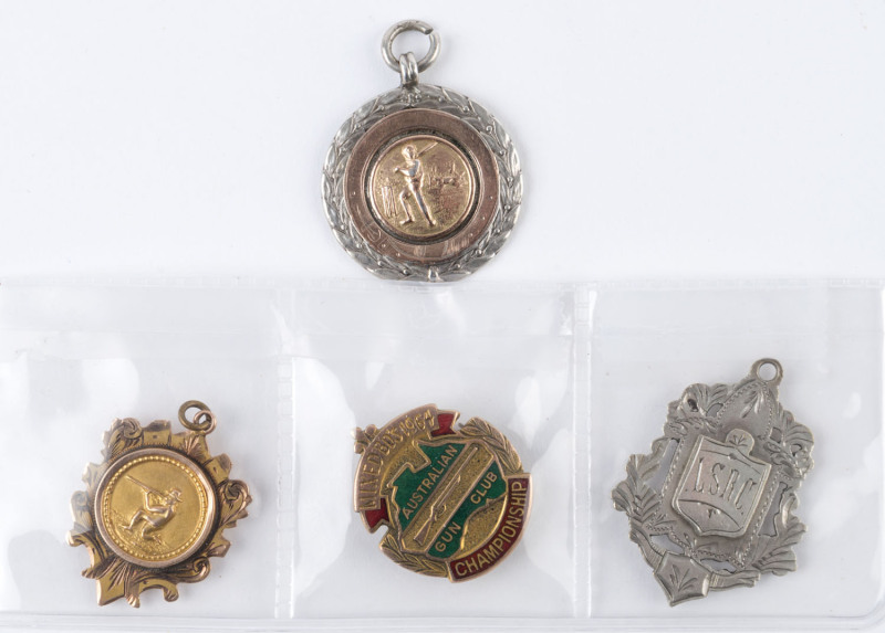 RIFLE & GUN CLUB AWARDS: A 1964 Australian Gun Club Championship award badge in 9ct gold and enamel (7.8gms); and undated Rifle Club award in 9ct gold (2.4gms) circa 1910; also, a sterling silver award fob (6.2gms) to B.Hay from the L.S.R.C. (3 items).