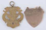 NEWSTEAD CRICKET CLUB: a 9ct gold presentation fob (3.4gms) depicting crossed bats, a ball and a shield, engraved verso "N.C.C. Pres. to J. FRISWELL - 1919 - Batting Average"; also, another 9ct gold presentation fob (3.6gms) with crossed bats and a cricke - 2