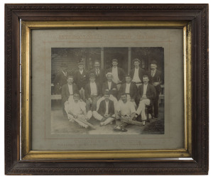1897 VICTORIA v TASMANIA INTERCOLONIAL CRICKET MATCH: captioned photograph of the Victorian team for an intercolonial game played at Launceston Cricket Ground Jan.20 to 22, 1897, won by Victoria by 8 wickets and 2 runs; window mounted, framed & glazed, overall 43x36cm.
