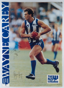 WAYNE CAREY - NORTH MELBOURNE: action image laminated poster of the North Melbourne legend, signed twice by Carey, 60x85cm.
