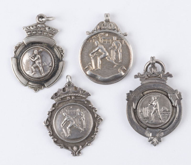 A group of sterling silver cricket fobs, engraved for awards in 1912, 1926, 1934 and 1948. (4 items).