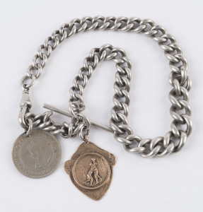 A 9ct gold fob (approx. 3gms) engraved verso "Presented to H. DUBOIS by R.I.F.C. 1915"; attached to a sterling silver chain weighing approx. 75gms.