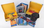 SYDNEY OLYMPICS: memorabilia with Opening Ceremony commemorative suitcases (2) with contents including "Green & Gold" socks, cheerband, torch, & opening ceremony programme; also necktie, Channel 7 cap, watch, spoon, NSW Police lapel badges set of 4 in pre