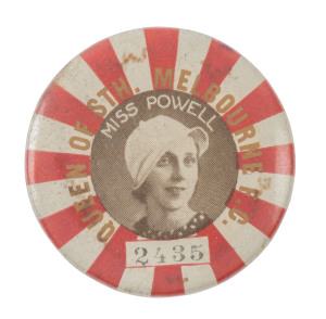 SOUTH MELBOURNE: 1933 badge with printed text in gold "QUEEN OF SOUTH MELBOURNE F.C." depicting  "Miss Powell" in a stylish hat; the unique number "2435" is stamped in the blank tablet below. Evidently a fund-raiser for the club, this is the only example 