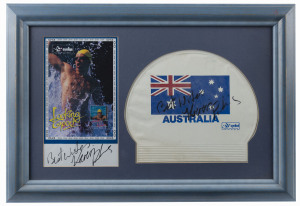 KIERAN PERKINS: display featuring signed swimming cap and an additional signature below an image showing him celelebrating after successfully defending his 1500m freestyle title, and winning Gold Medal at the Atlanta Olympics; framed & glazed; overall 55x