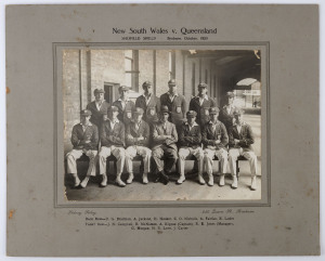 NEW SOUTH WALES v QUEENSLAND : SHEFFIELD SHIELD - Brisbane, October, 1928: The official NSW team photograph by Sidney Riley, Brisbane, with Kippax as captain and the very young Don Bradman in the back row. Laid down on the original backing card, overall 30 x 38cm. New South Wales won the Shield, with Bradman scoring the most runs in the whole competition, 893.