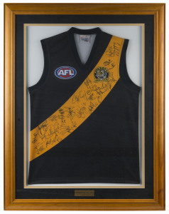 RICHMOND - 2005 SQUAD: Football Jumper (size M) with approximately 30 signatures and CofA; window mounted, framed & glazed, overall 78 x 101cm.