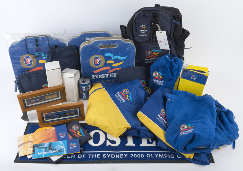 SYDNEY OLYMPICS: Fosters Lager sponsored memorabilia including backpack, valuables wallets (3), Ceremony Tickets (2), Souvenir Tickets (2), packs of 4 beers (2), 'beercan' cameras with film (2), anoraks (2), bum mats (3), cap, sports sweater; also framed