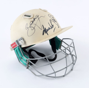 SHANE WARNE: c. early 2000s Gray Nicholls cricket helmet SIGNED BY SHANE WARNE plus fellow Victorians BRAD HODGE & DARREN BERRY; good condition.