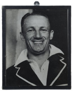 DON BRADMAN: framed portrait photo of smiling Bradman, annotated on reverse, in Bradman's hand "A reminder of our very pleasant day./Kent v Australians/at Canterbury August 23rd 1948./Don Bradman at Kennington Oval./Final Test Match August 1948; overall 2