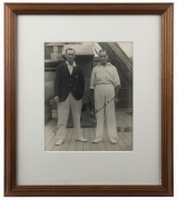JACK HOBBS & HERBERT SUTCLIFFE, fine pen signatures on original photograph of the pair on board ship while en route to Australia, window mounted, framed & glazed, overall 38x45cm.The England cricket team toured Australia in 1928–29. England retained The A - 2