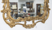 An antique Chippendale style gilt framed mirror with griffin finial, 19th/20 century, 140 x 80cm - 2