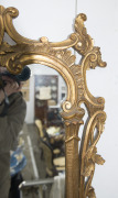 An antique Chippendale style gilt framed mirror with griffin finial, 19th/20 century, 140 x 80cm - 6