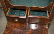 An antique lady's lift-top work table, amboyna with string inlay, silk lined interior with two drawers and leather implement compartments under the lid, 19th century, 77cm high, 42cm wide, 37cm deep - 11