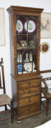 A rare pair of antique English Hepplewhite mahogany bookcases, 18th century, unusual slim proportions with flame mahogany drawer fronts, cockbeading and astragal glazed doors with adjustable shelving. With accompanying documentation from Windsor Antiques, - 2