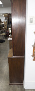 A rare pair of antique English Hepplewhite mahogany bookcases, 18th century, unusual slim proportions with flame mahogany drawer fronts, cockbeading and astragal glazed doors with adjustable shelving. With accompanying documentation from Windsor Antiques, - 17