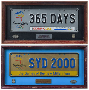 2000 SYDNEY OLYMPICS: limited edition commemorative number plates comprising "Sydney 2000, '365 DAYS', The Olympic Club", numbered 110 of 150; also "Sydney 2000, 'SYD2000', The Games of the new Millennium" numbered 696 of 2000; both items framed and glaze